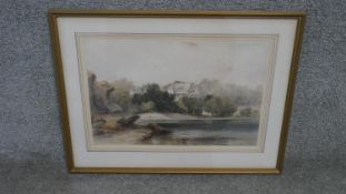 A framed and glazed watercolour landscape of a house by a lake. Signed. H.46 W.59cm