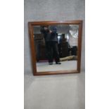 A mahogany framed wall mirror with bevelled plate. H87 W80