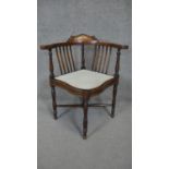 A C.1900 rosewood corner chair with floral inlaid cresting to back rail and ivory stringing to the