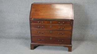 A Georgian mahogany bureau with satinwood inlaid fitted interior. H.114 W.92 D.50cm
