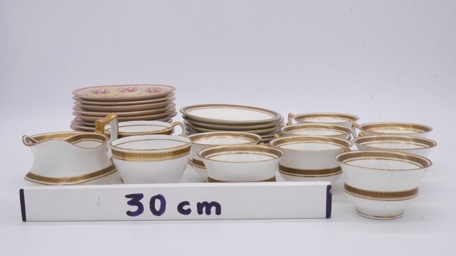 A set of twelve Aynsley 19th century hand painted and gilded porcelain saucers decorated with roses. - Image 9 of 9