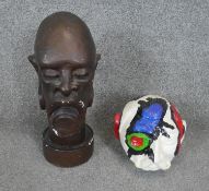 A plaster bust along with a polychrome papier mache bust.