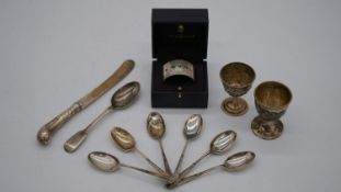 A collection of silver. Including a cased silver napking ring, hallmarked: Asprey & Garrard, London,