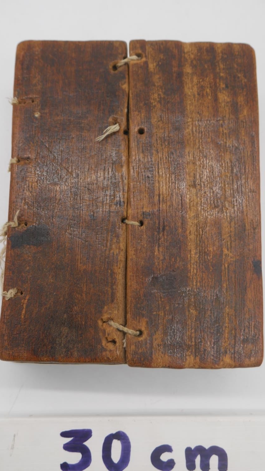 A 19th century Ethiopian coptic manuscript on vellum in wooden boards. Handwritten script in red and - Image 8 of 8