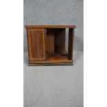 An Edwardian mahogany and satinwood inlaid revolving table top bookcase. h30 w36cm