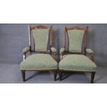 A pair of C.1900 beech framed newly upholstered armchairs with rosewood, satinwood and ivory