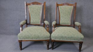 A pair of C.1900 beech framed newly upholstered armchairs with rosewood, satinwood and ivory