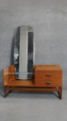 A 1970's vintage teak dressing table. W112 D48 H145 (Mirror detached, needs replacement screws).