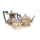 A four piece silver plated coffee and tea service, the tea pot and coffee pot having ebony