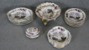 An 18th century 18 piece part Derby hand painted and gilded Japanese design dinner service.