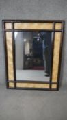 A bamboo framed wall mirror. H.83 W.51cm