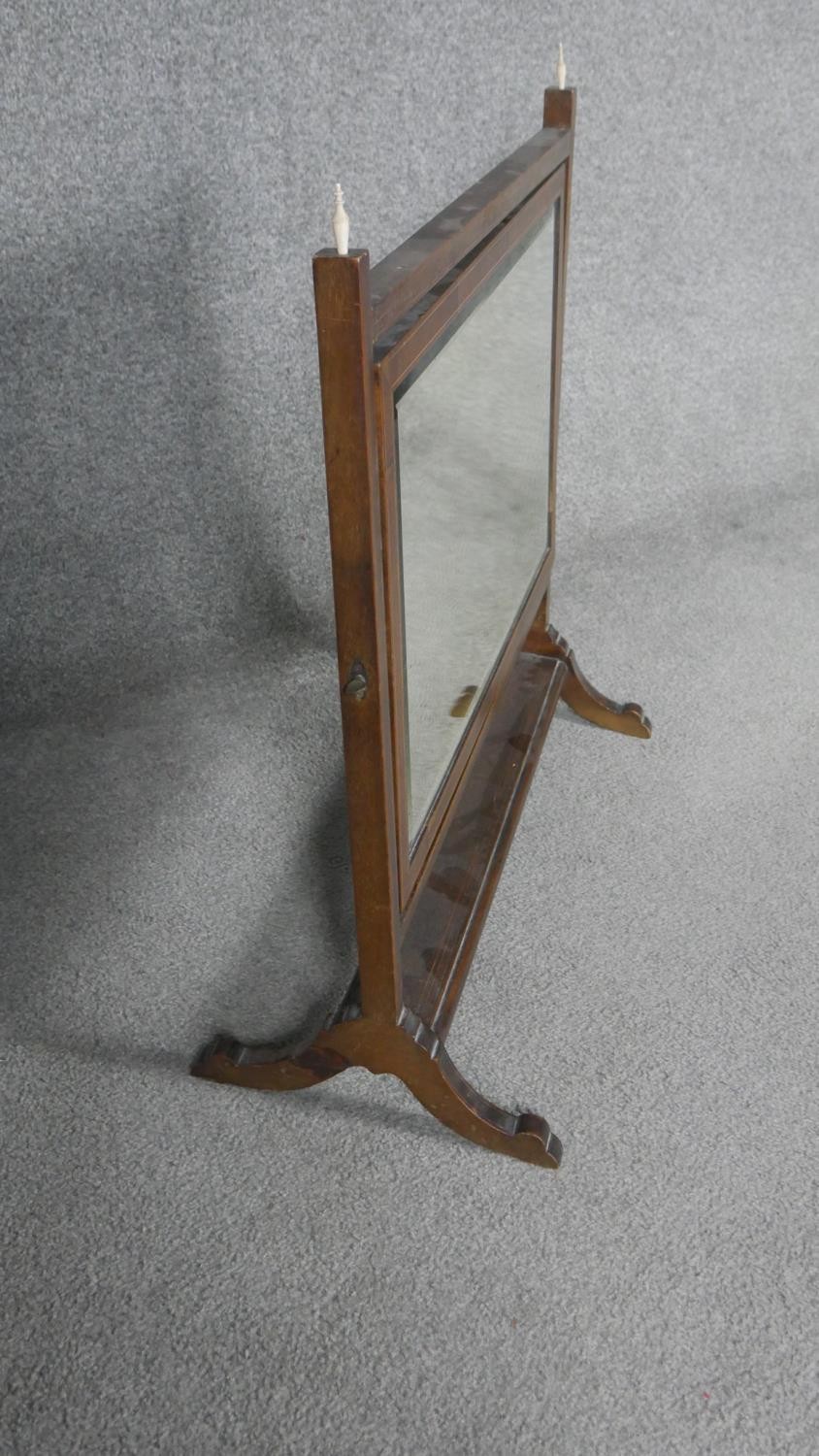 A 19th century mahogany and satinwood strung skeleton framed toilet mirror. W.64 D.28 H.60 - Image 3 of 3
