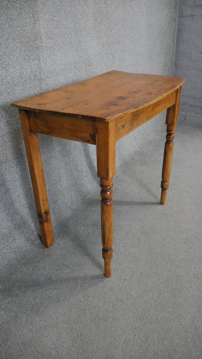 A 19th century pine bow fronted side table. H.73 W.76 D.45cm - Image 3 of 3
