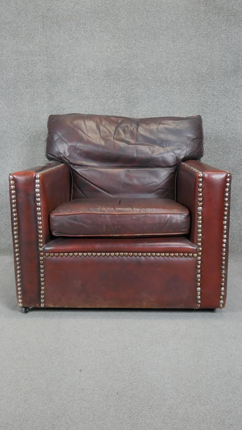 A pair of vintage library armchairs in studded tobacco leather upholstery. - Image 3 of 5