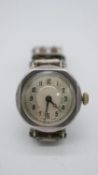 An Italian Metro Watch company Swiss made Art Deco silver watch with articulated mesh silver strap