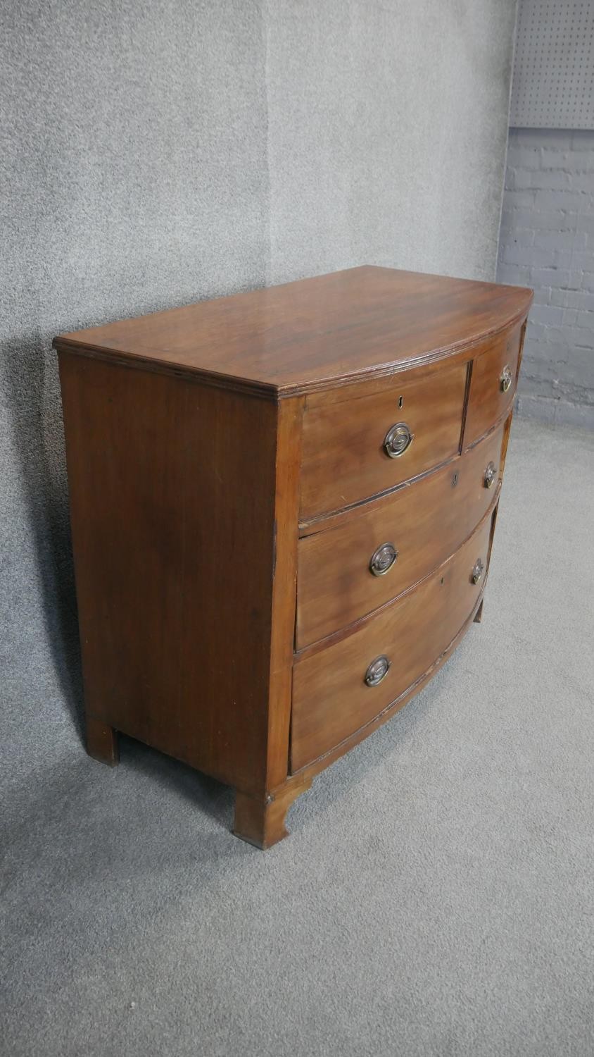 A 19th century mahogany bow fronted chest on shaped bracket feet. h87 w107 d54 - Image 2 of 3