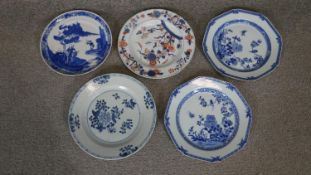 Five 19th century Oriental blue and white hand painted porcelain plates, one with a blue and red