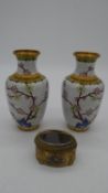 A pair of Chinese cloisonne enamel vases with blossom and bird decoration along with a gilt metal