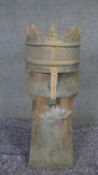 A large terracotta 20th century chimney pot. H.88cm