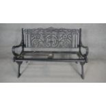 A vintage wrought iron garden bench. H.85 W.130 D.66cm (Missing seat slats as photographed).