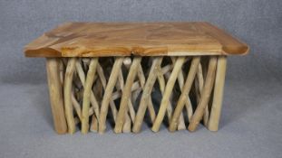 A contemporary coffee table from scrap burr elm and driftwood. H.44 W.88 D.60cm
