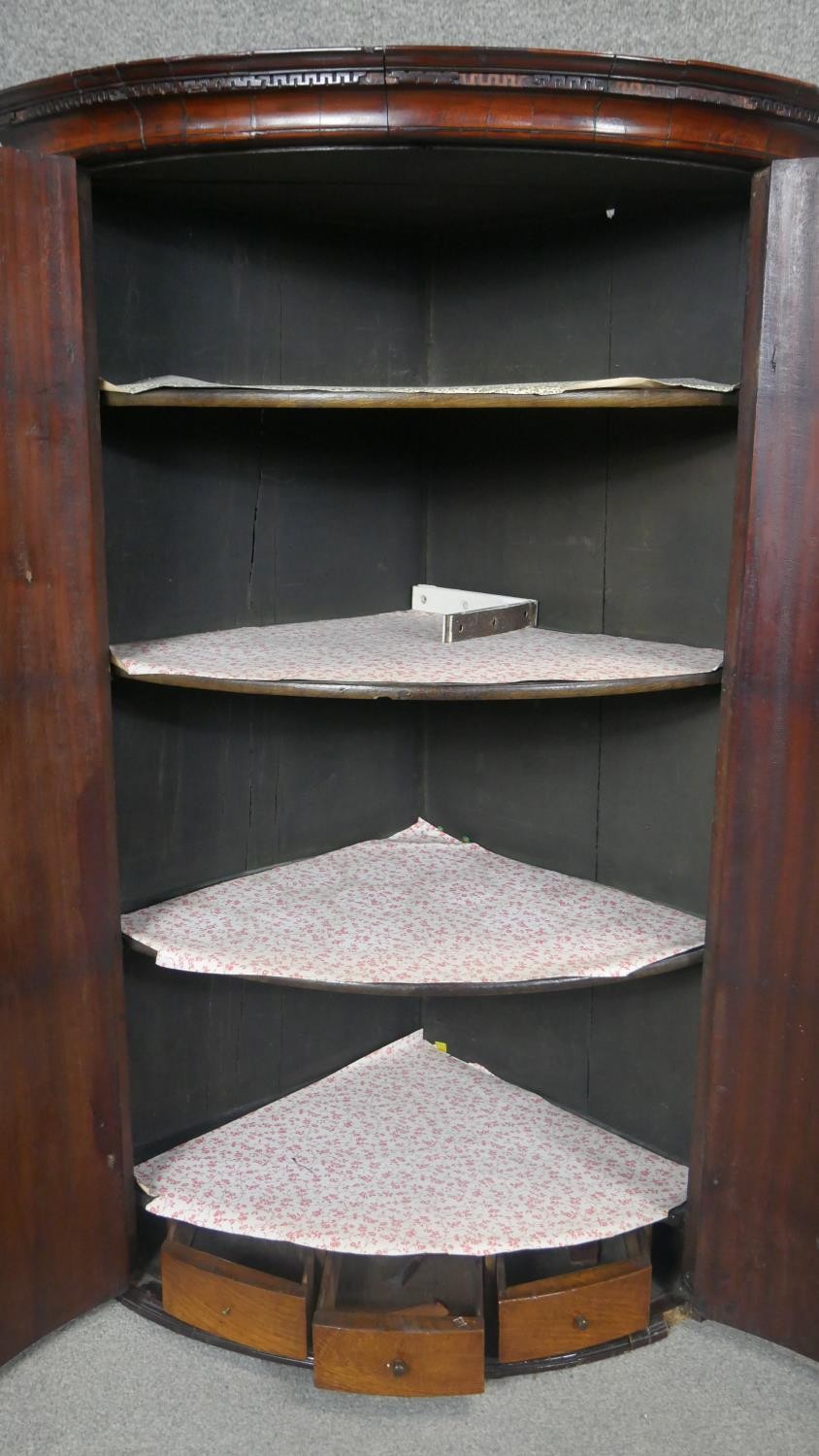 A Georgian mahogany hanging corner cabinet, the bow fronted panel doors enclosing shelves and base - Image 2 of 5