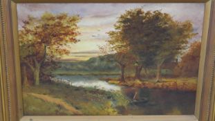 A carved gilt framed oil on canvas of a river landscape at sunset, monogrammed P.K. Inscribed H.