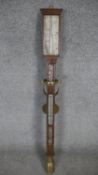 An early 19th century gimbal rosewood and mother of pearl inlaid ships barometer with brass fittings