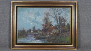 A large framed oil on canvas, cottage by a river, signed L Baguet. W.110 H.82