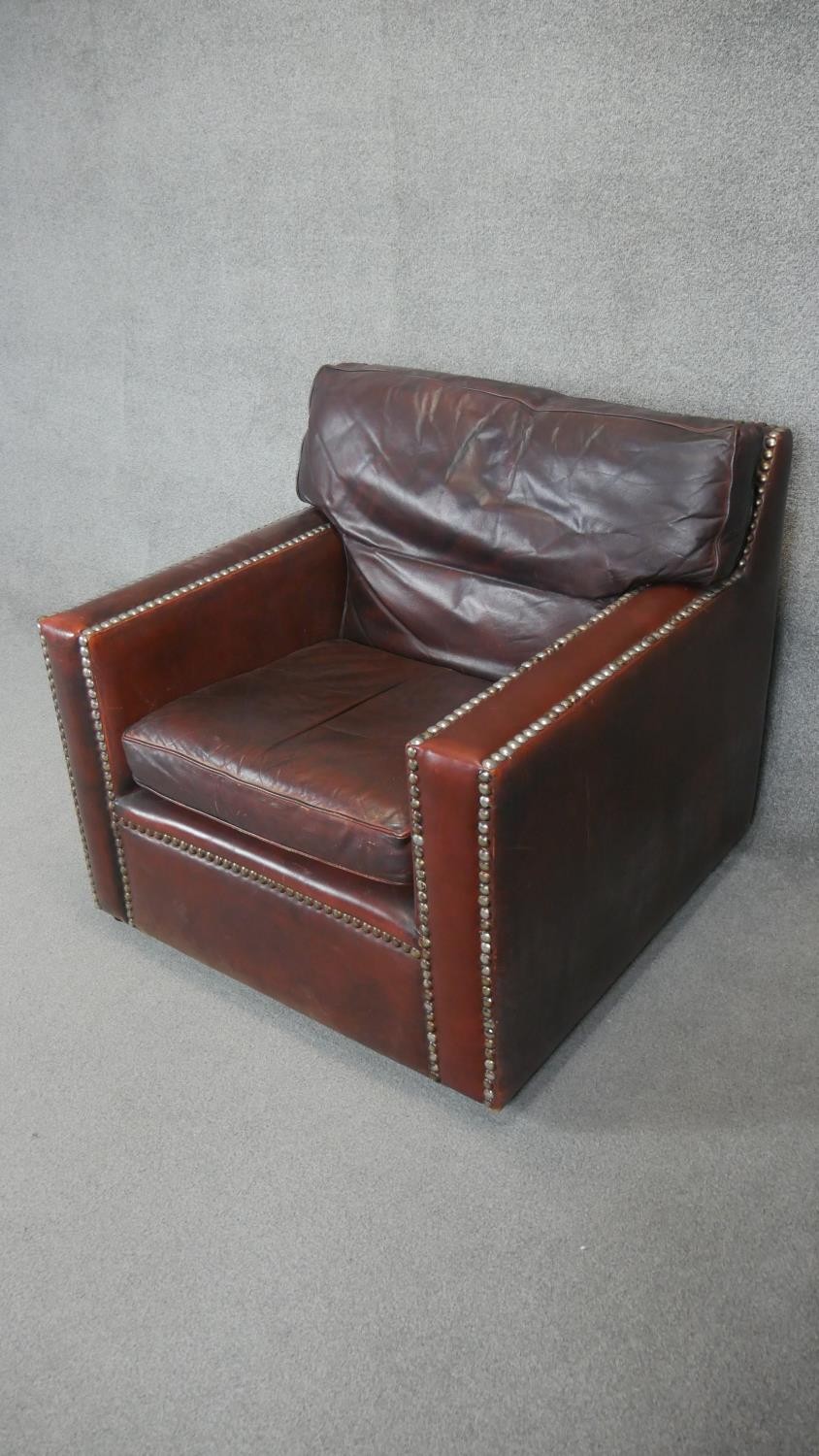 A pair of vintage library armchairs in studded tobacco leather upholstery. - Image 4 of 5