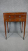 A 19th century mahogany dressing table with fold out top revealing a fitted interior with adjustable