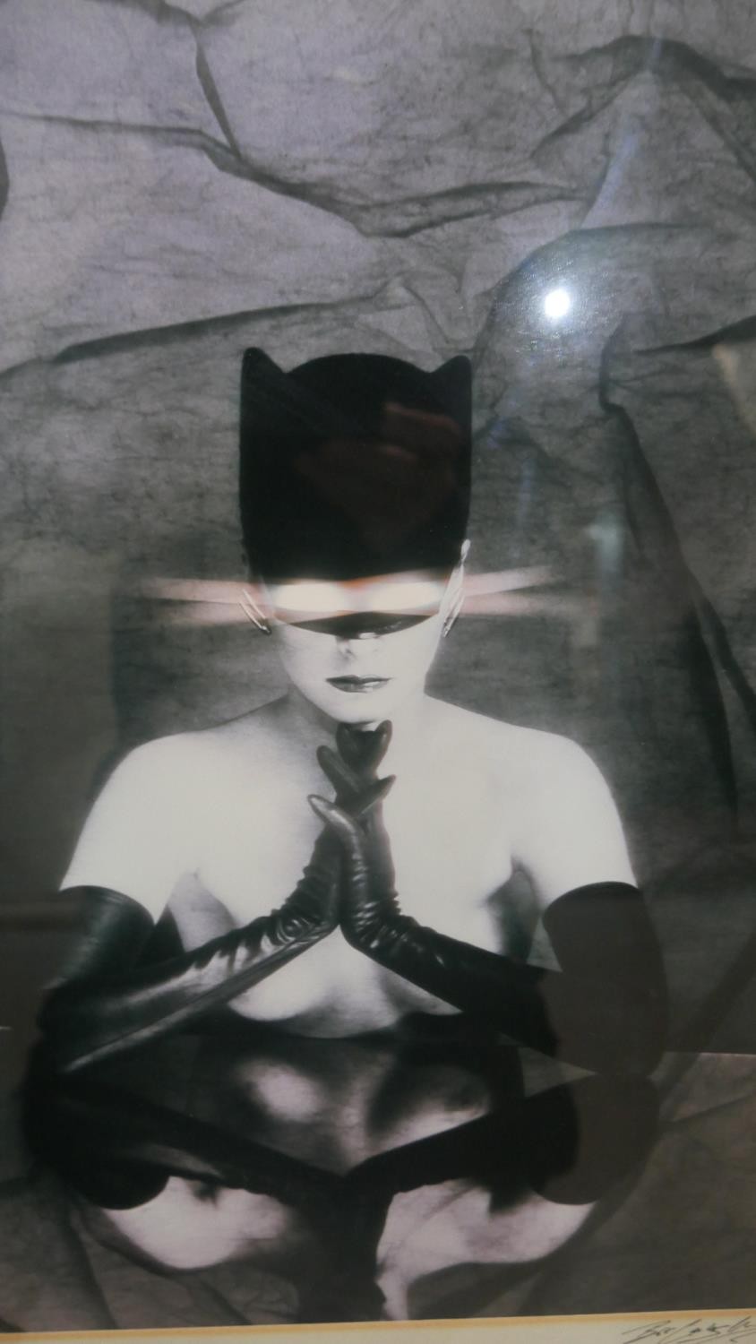 Bob Carlos Clarke (Irish, b. 1950)- A framed and glazed black and white phographic print, cat woman, - Image 3 of 4