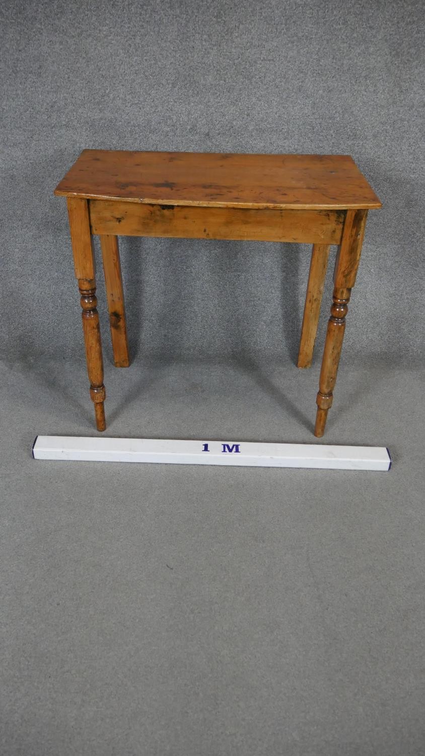 A 19th century pine bow fronted side table. H.73 W.76 D.45cm - Image 2 of 3