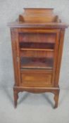 An Edwardian mahogany and satinwood inlaid music cabinet. H.120 W.56 D.36cm
