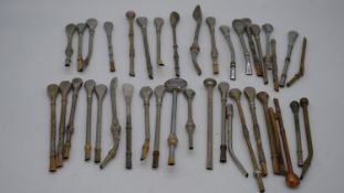 A collection of thirty nine South American maté straws various metals and designs. L.23 (Longest)