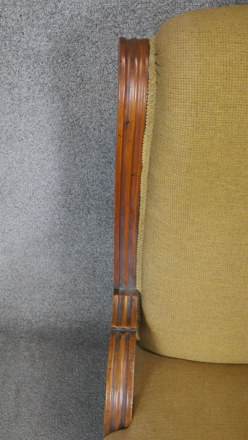 A Victorian walnut upholstered nursing chair on turned tapering supports. - Image 3 of 3