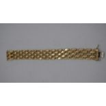 A 14 carat gold vintage articulated faceted design mesh bracelet with hidden push clasp and double