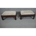 A pair of Georgian mahogany footstools with drop in seats on square supports. W.33 D.23cm