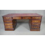 A large Georgian style mahogany three section pedestal desk. H.78 W.183 D.92cm