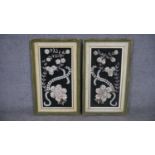 A pair of framed 20th century shell collages with a floral design. Composed of various seashells.