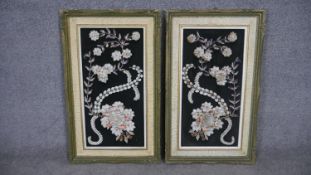 A pair of framed 20th century shell collages with a floral design. Composed of various seashells.
