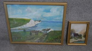 Two framed oils on board landscapes (one glazed). One of a cliff seascape signed Wright and a