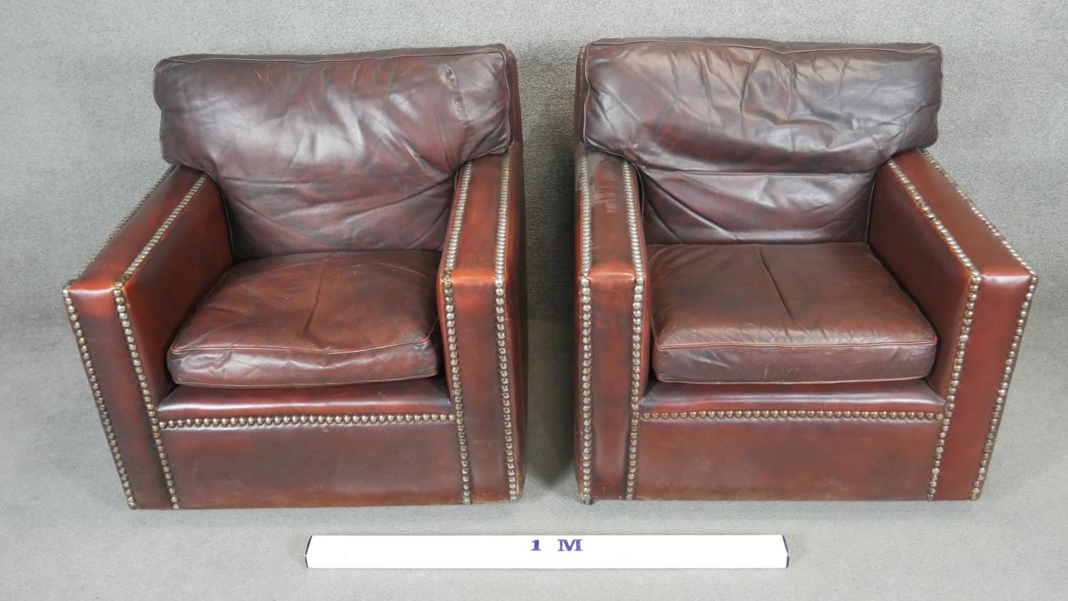 A pair of vintage library armchairs in studded tobacco leather upholstery. - Image 2 of 5