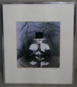 Bob Carlos Clarke (Irish, b. 1950)- A framed and glazed black and white phographic print, cat woman,