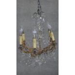 A vintage brass and blown twisted glass six branch chandelier with crystal drops and swags. H.67cm