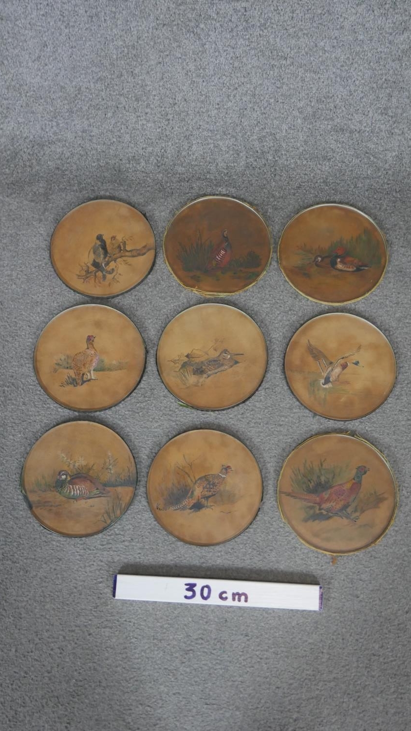 A set of nine 19th century watercolours under glass circular place mats with various game birds. - Image 2 of 5