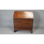 A Georgian mahogany bureau with satinwood inlaid fitted interior. H.114 W.92 D.50cm