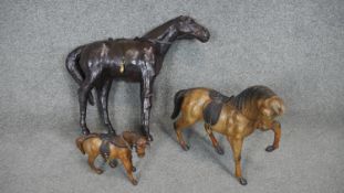 Three vintage leather figures of horses. H.42 (Largest)