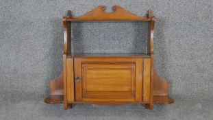 A 19th century satin walnut hanging bookcase. H.53 W,70 D.18cm