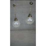 A pair of etched and frosted glass hanging ceiling lamps. Dia.25cm